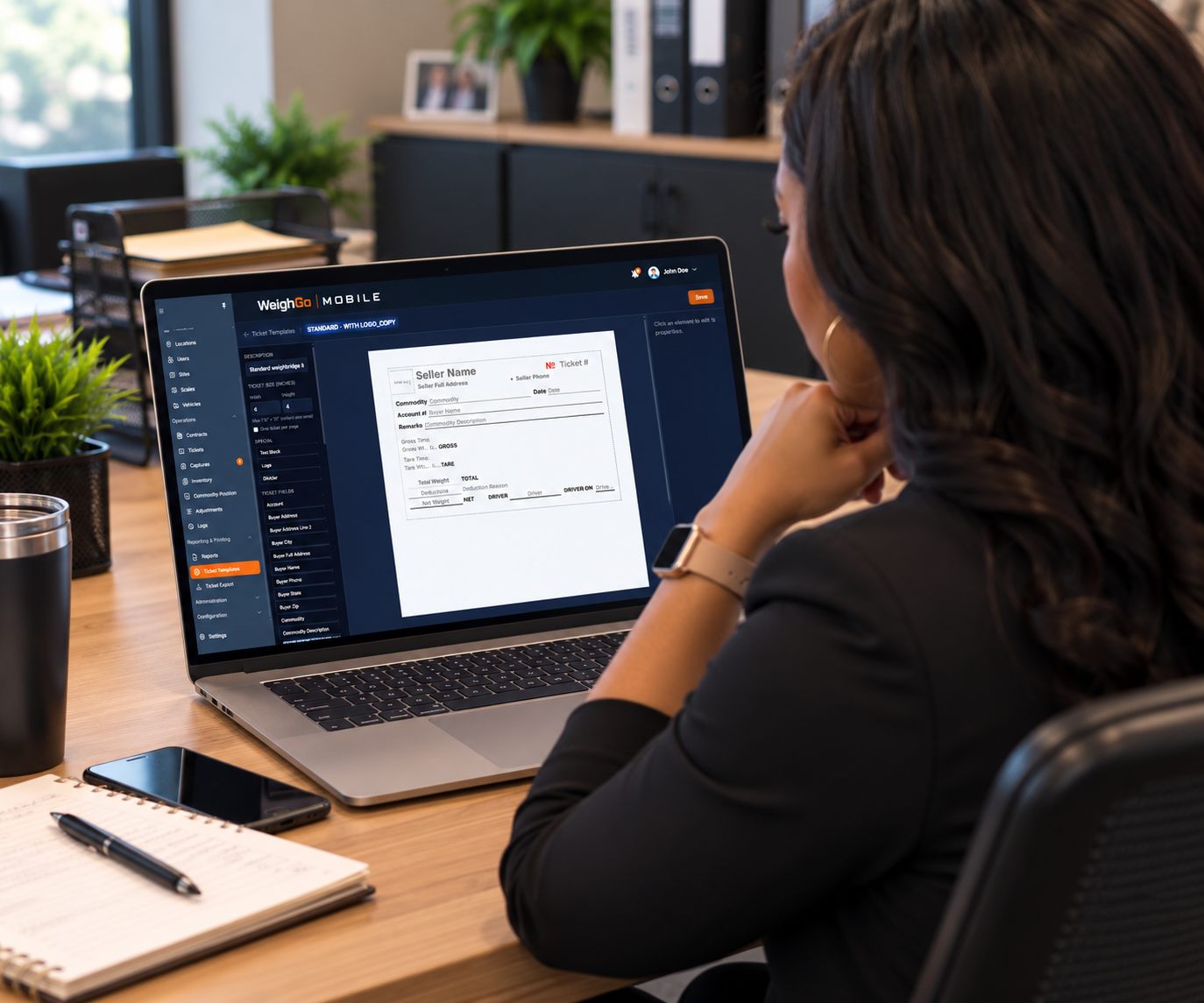 Office user designing a ticket layout in the WeighGo Mobile ticket template builder